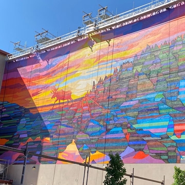 A photo of Atlas' work on the Courthouse Mural project